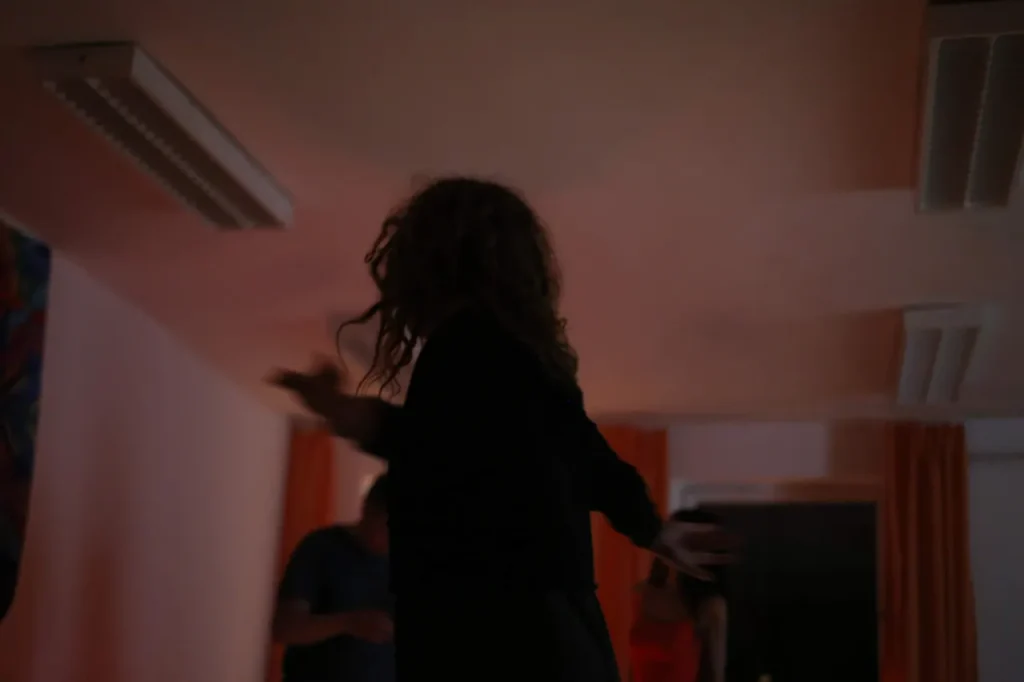 Silhouetted person in motion, representing how past emotions can shape perception in relationships